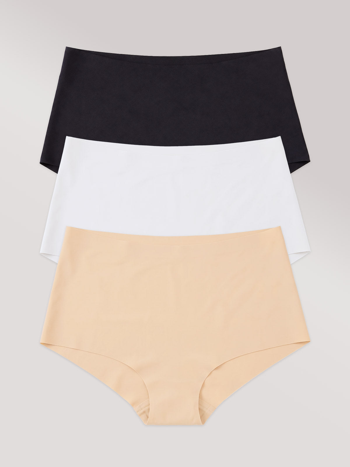 Kit com 3 Calcinhas Hot Pant Invisível Sem Costura (1 Preto, 1 Branco e 1 Bege)