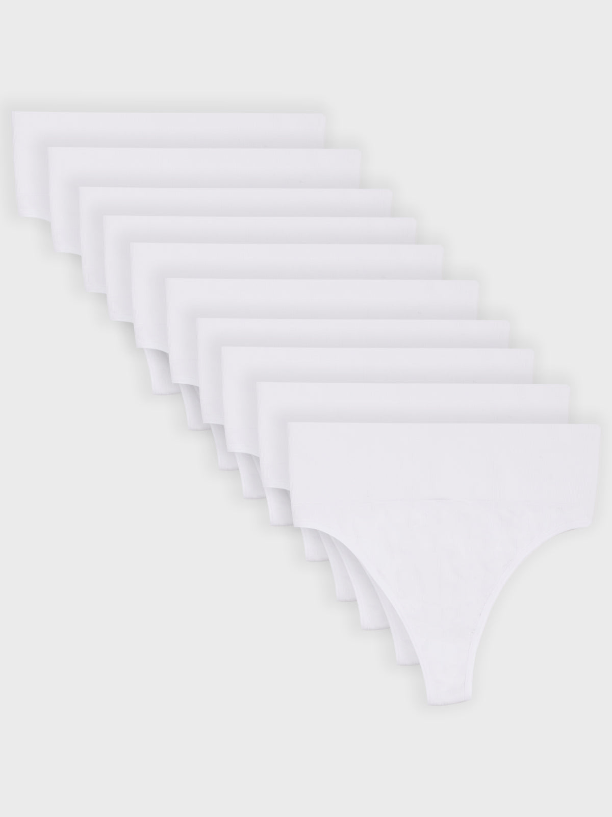 Kit com 10 Calcinhas Fio Dental Redutora Canelado Sem Costura Premium Branco - R$76,49 cada