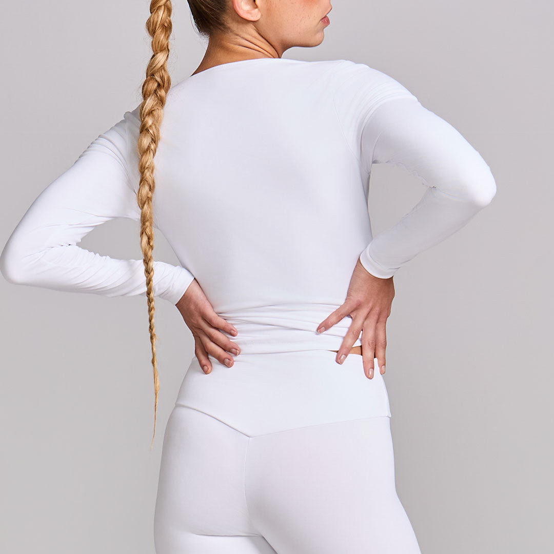 Calcinha para usar com legging: mulher de legging em ambiente de treino