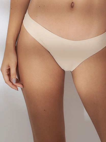 Kit com 3 Calcinhas Fio Dental Sem Costura Segunda Pele Bege - R$23,30 cada